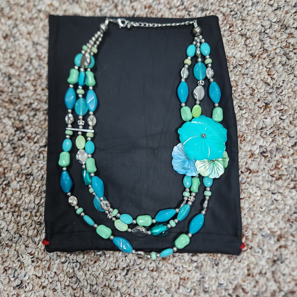 Elegant Multi-Strand Necklace with Floral Accent